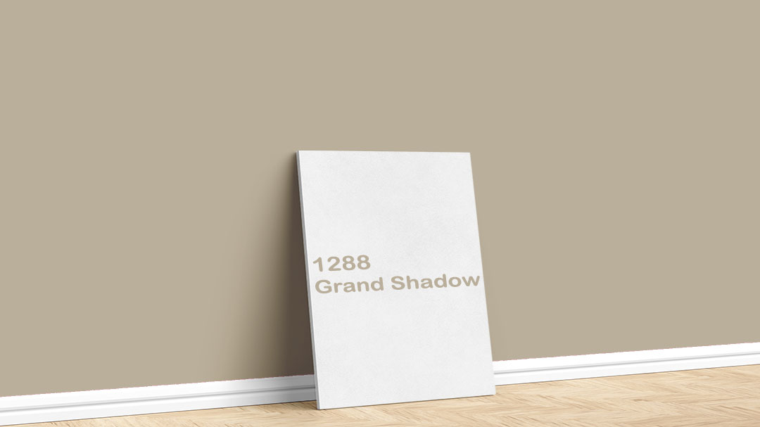 Jotun Yeşilimsi Bej Boya Rengi – 1288 Grand Shadow. Jotun yeşilimsi bej boya rengi için kullanılan görselde, 1288 Grand Shadow isimli iç cephe boyasıyla boyalı bir duvar var.